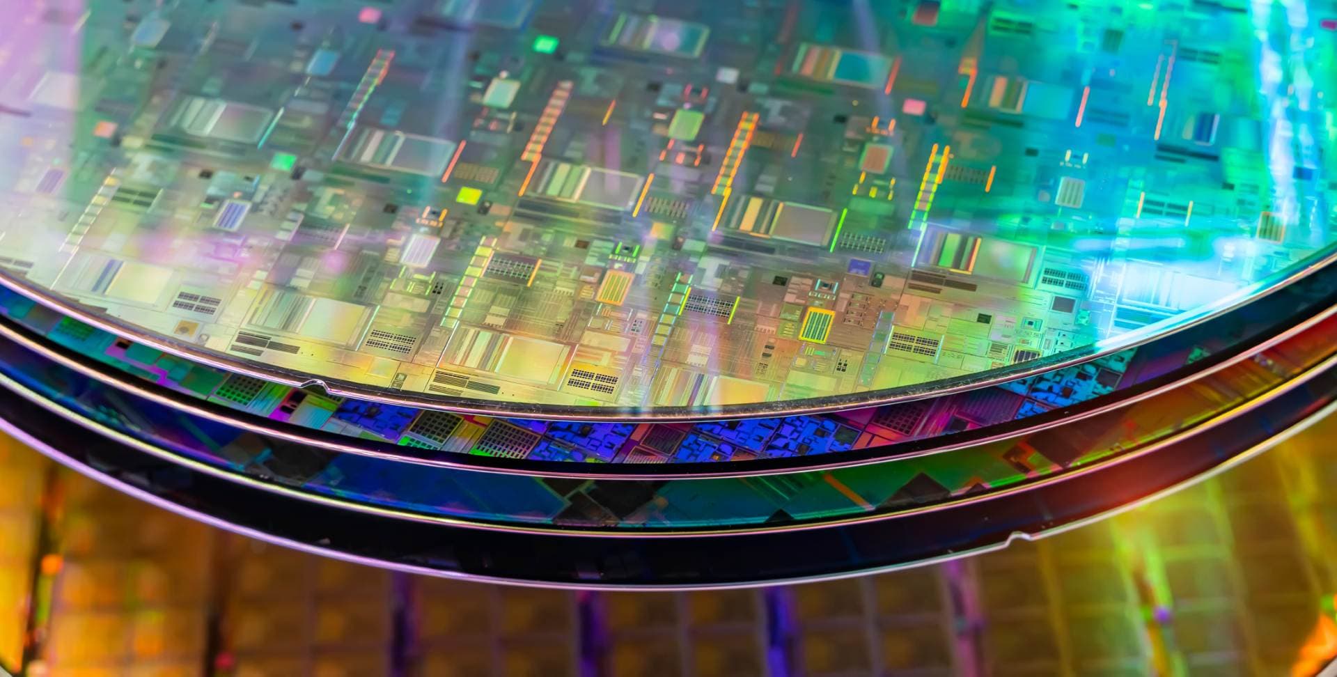 Silicon wafer showing iridescent die patterns