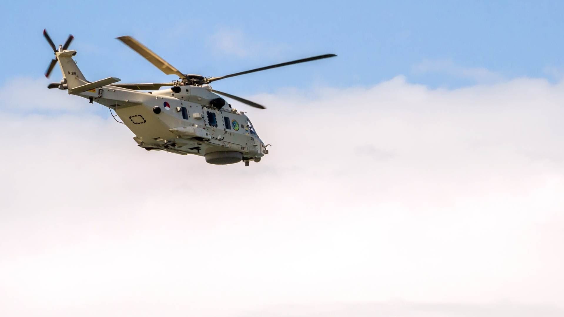 Military helicopter in flight
